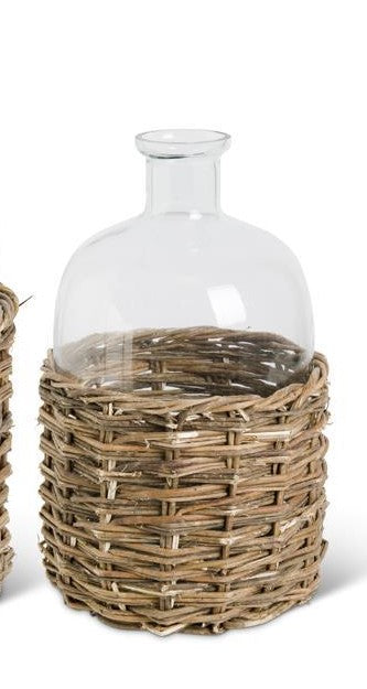 Clear Glass Bottles in Woven Rattan Basket