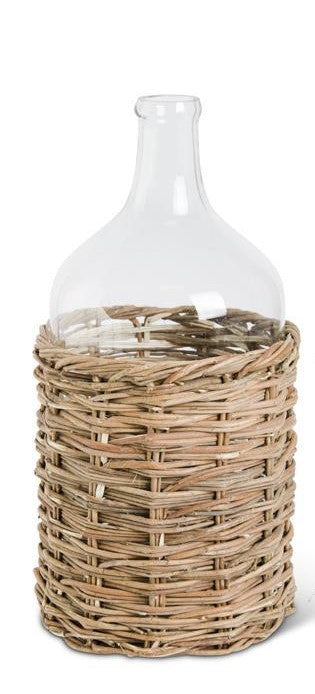 Clear Glass Bottles in Woven Rattan Basket