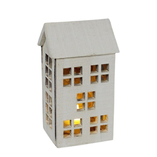 Lighted Snowy Tall House