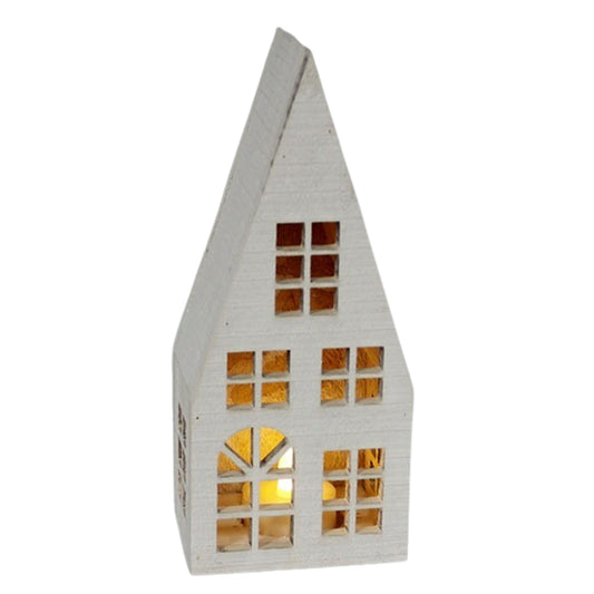 Lighted Snowy Steep Roof House